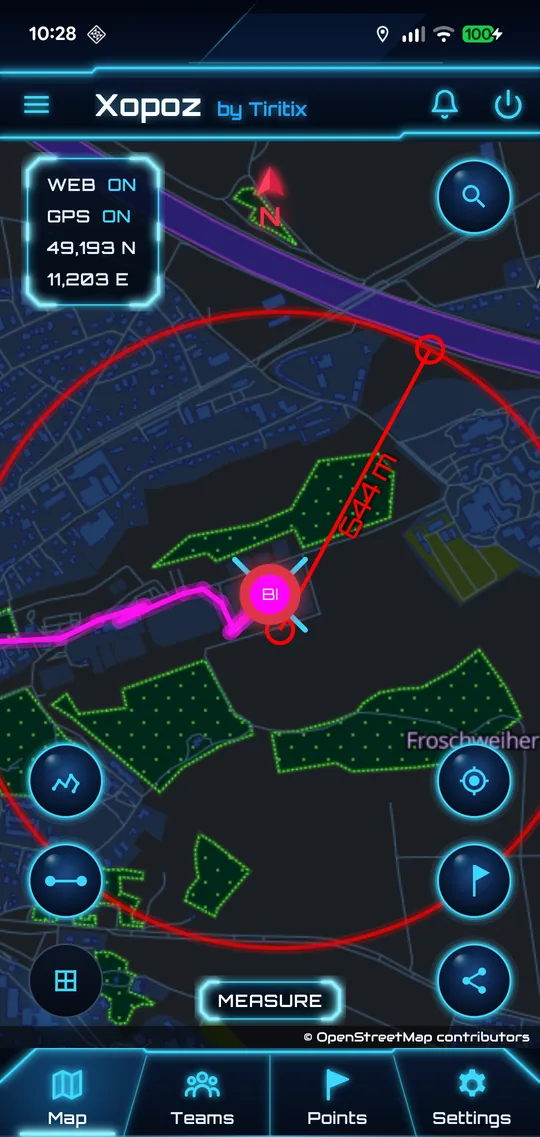 Map in Measure mode: two red points joined by a red line labelled with the distance, and a large red circle centred on the first point